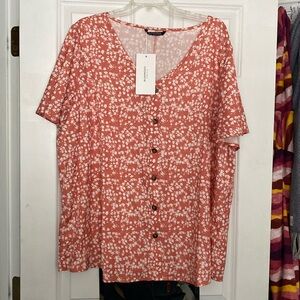 Bloom Chic Ditsy Floral Ruffle Sleeve Button Detail Blouse in orange.